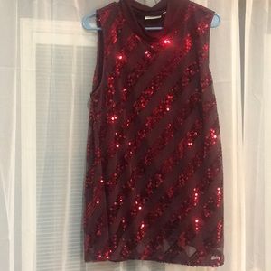 Sleeveless sequin tunic missing a couple sequins